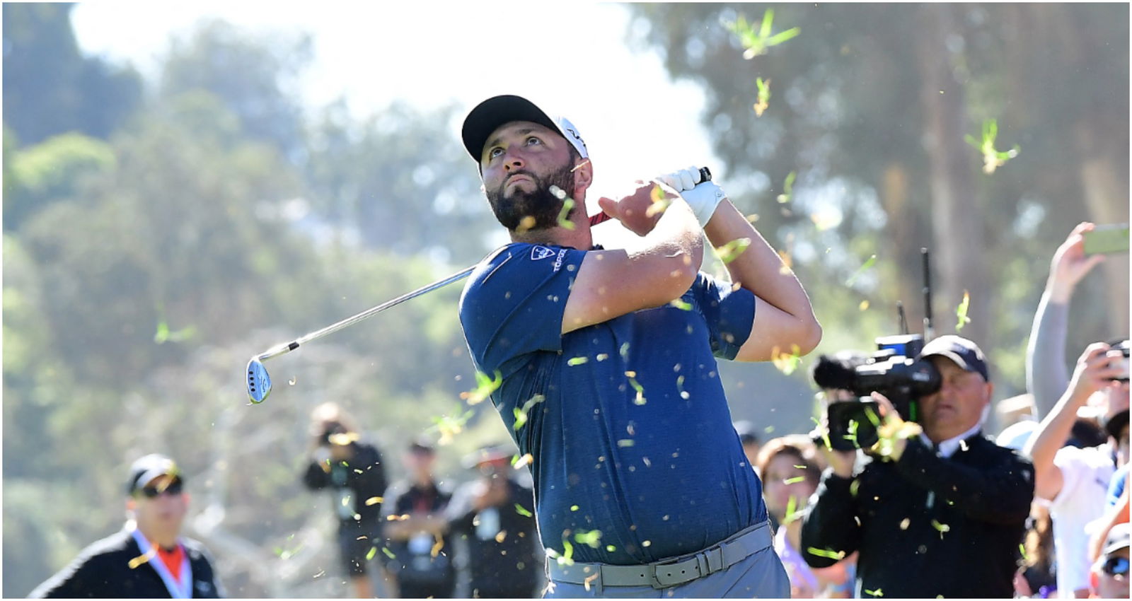 WATCH: Two golf fans FAKE injuries after Jon Rahm tee shot at Riviera